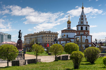 Russia, Irkutsk - May 27, 2021: The Cathedral of the Epiphany of the Lord. Orthodox Church close to Angara river embankment and parkのeditorial素材