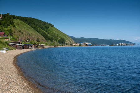 Baikal Lake in summer day. Focus on clear transparent water and coastal stones. Summer travel.の写真素材