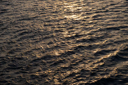 Grey tones water waves surface as background