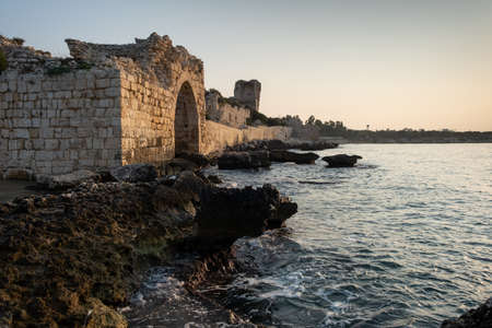 Kizkalesi or Maiden Castle near Mersin on a small island at sunrise