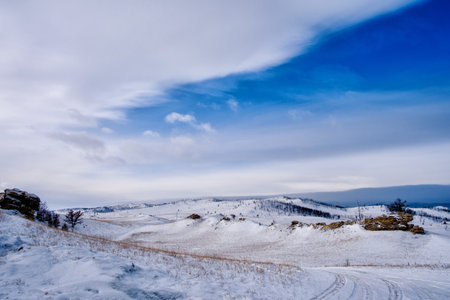 Tazhenranskaya steppe in winter on west coast of Lake Baikal, Siberiaの写真素材