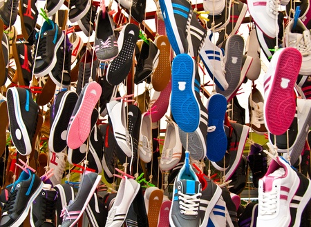 Hanged Colorful Shoes At A Street Market In Istanbul, Turkey.  Carsamba Fatih Pazari (Bazaar)のeditorial素材