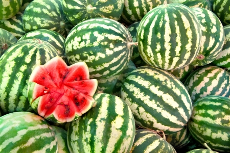 Organic Ripe Watermelon Heapat a street marketの写真素材