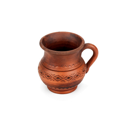 clay jug handmade isolated on white backgroundの写真素材