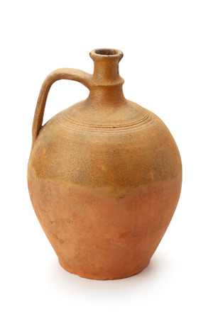 clay jug handmade isolated on white backgroundの写真素材