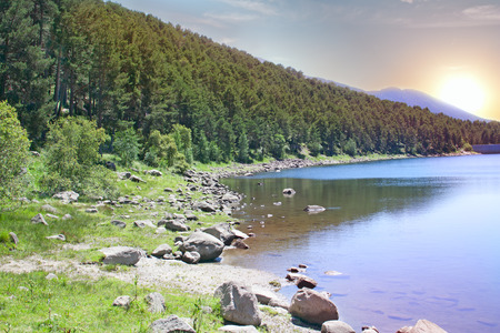 Beautiful landscape with mountain lake at dawnの写真素材