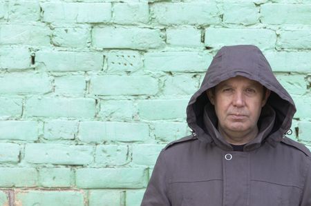 man and green wallの写真素材