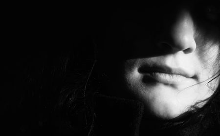 girl in shadow(special photo f/x,focus point on the lips)の写真素材