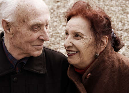 senior love story (focus point on her eye, special sepia photo toned f/x)の写真素材