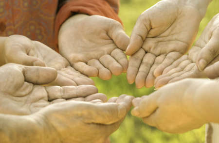 together (special warm evening light, focus point on  center hands (red shirt))