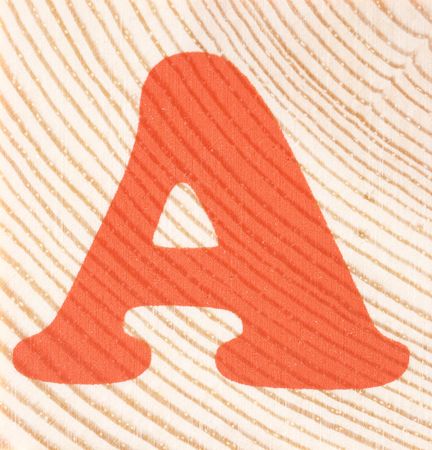 wooden background with letter a, focus point on centerの写真素材