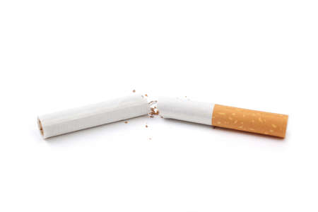 broken cigarette isolated on white background, focus on centerの写真素材