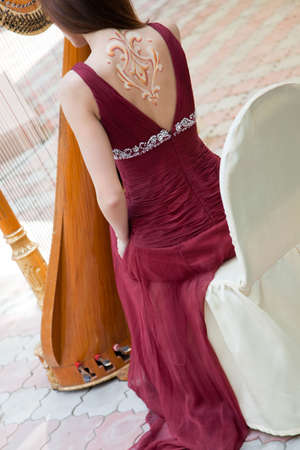 beatiful harp player on celebration , selective focusの写真素材