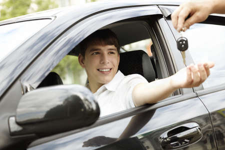 car rent or leasing concept, selective focus on eyesの写真素材