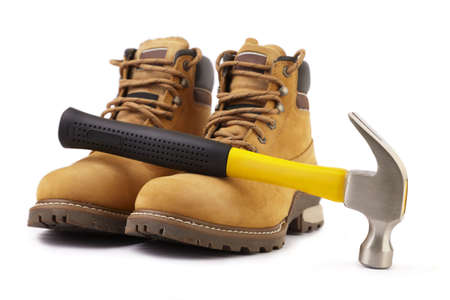 working boots and hammer の写真素材