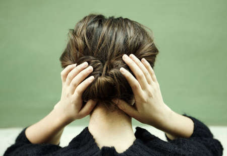 female concept, special toned photo f/x, selective focus on nearest part of fingersの写真素材