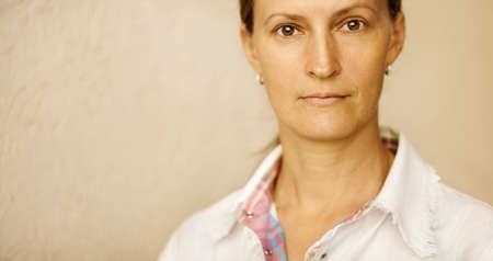 closeup of middle-aged adult ,soft natural light, selective focusの写真素材