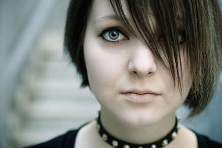 emo or goth young woman, natural soft light,selective focus on eyeの写真素材