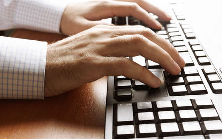 hands of businessman on keyboard, selective focusの写真素材