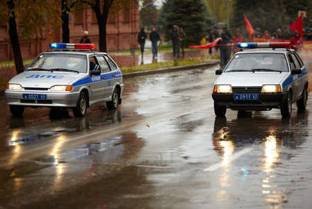 Samara, Russia - November 7 ,2010-  two cars of Russian traffic police on on Communist  Party demonstration のeditorial素材