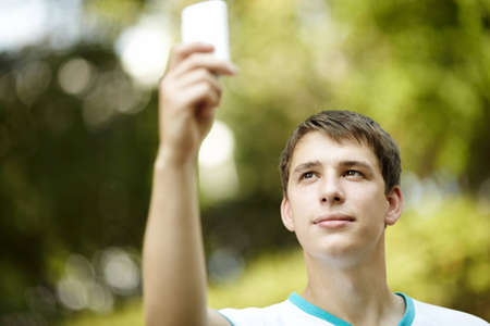 teen with palmtop の写真素材