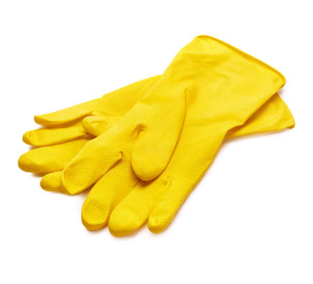 Yellow dish gloves isolated on white background with soft shadow,selective focusの写真素材