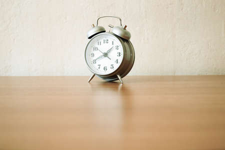 russian vintage clock on the table, selective focus and natural light の写真素材