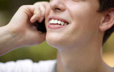 young man with cell-phoneの写真素材