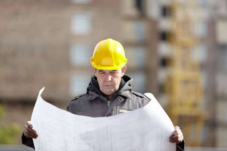  builder with blueprints の写真素材