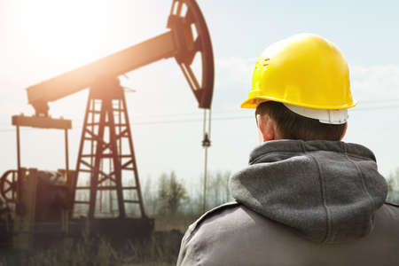 Oil worker in yellow helmetの写真素材