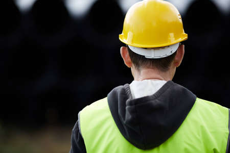 builder with yellow hard hatの写真素材