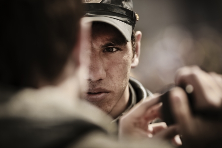 Samara,Russia-May 1, 2012:angry face of the policeman on the communist demonstration in Samara ,Russia on Maydayのeditorial素材