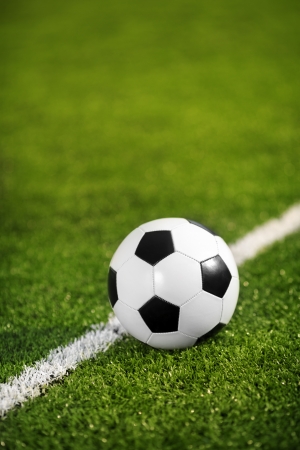 Soccer Ball Resting on Line の写真素材