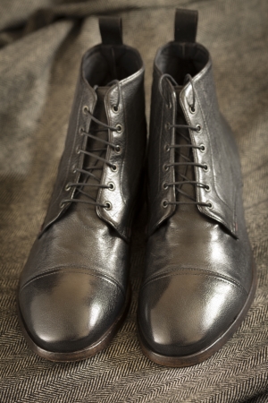premium leather hand-made shoes, selective focus on nearest partの写真素材
