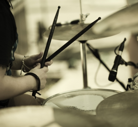 hands of the drummer on the rock concert, selective focus on handsの写真素材