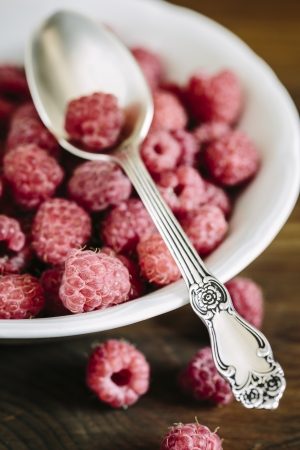 fresh raspberry  wooden table ,selective focusの写真素材