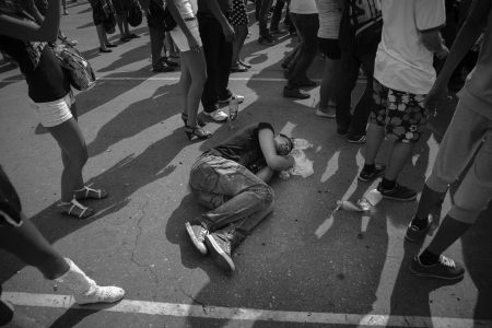 drunken teenager sleeping at  the street  Samara, Russiaのeditorial素材