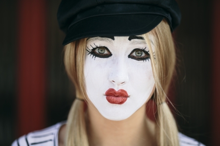 portrait of sad mime with black hatの写真素材