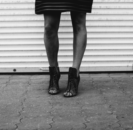 female legs on the street, black and white tonedの写真素材
