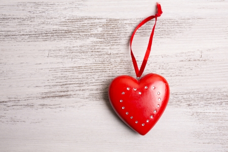 red heart on the wooden backgroundの写真素材