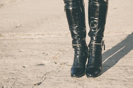 black boots of whore on the street,selective focus