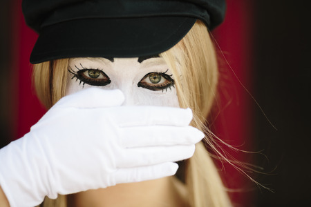 portrait of mime with black hat and white glovesの写真素材