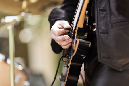 Man playing guitar, selective focusの写真素材