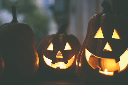 pumpkins with candles, selective focusの写真素材