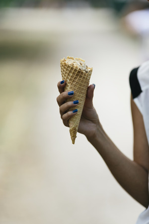 Woman Holding a  Ice Cream Cone , selective focusの写真素材