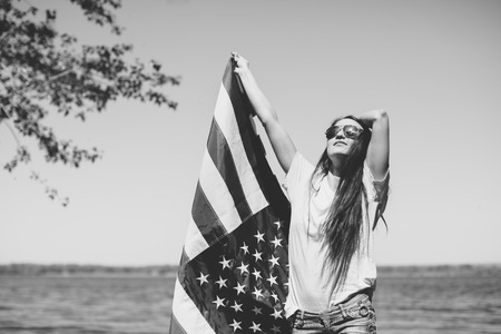 woman with USA flagの写真素材