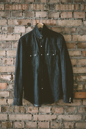 denim shirt on the brick backgroundの写真素材
