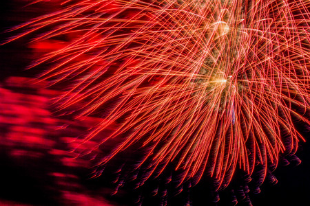 red firework on festival at sunset
