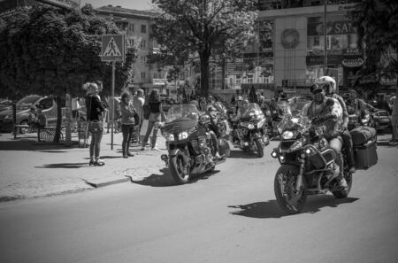 Black and white photos of bikers who are preparing for the parade in honor of opening the season. Ukraine, Ivano-Frankivsk, 12 May, 2018. Opening of the biker seasonのeditorial素材