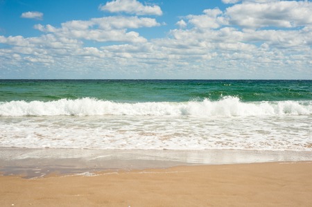 Sea wave on the shore of Sozopol in Bulgaria. Sandy summer day.の写真素材